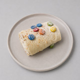 Mini brazo de gitano de chocolate blanco con Lacasitos