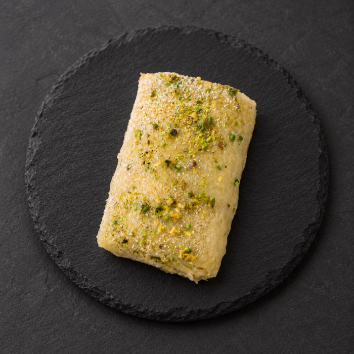 Mini brazo de pistacho sobre pizarra | Tu Obrador Tarragona