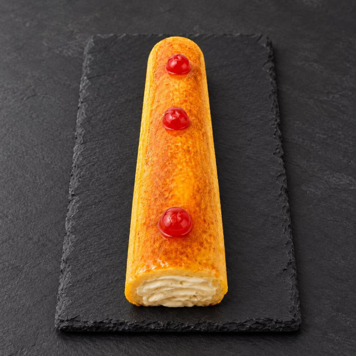 Brazo de crema pastelera sobre pizarra | Tu Obrador Tarragona