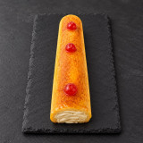 Brazo de crema pastelera sobre pizarra | Tu Obrador Tarragona